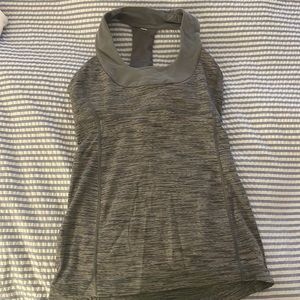 Lululemon fitted tank top that includes bra and cups.